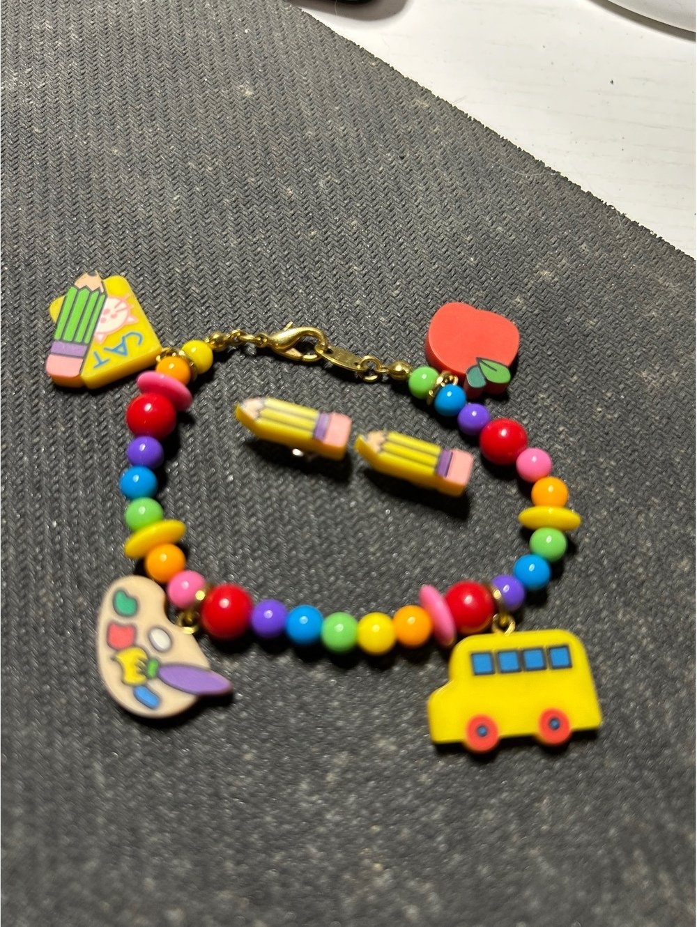 Vintage Avon school bracelet and earring